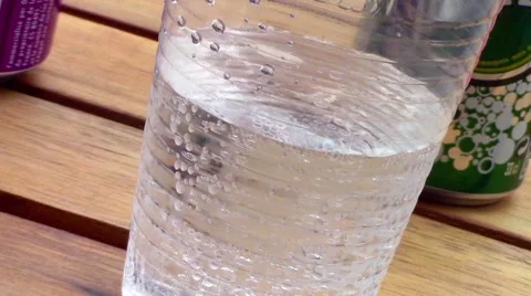 Plastic glass of water with bubbles Stock Footage 66188693
