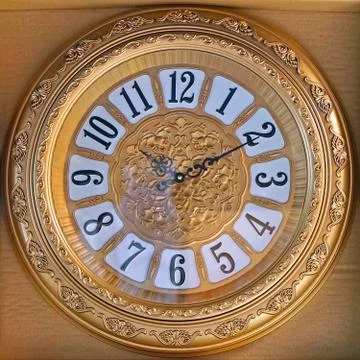 Plastic gold clock Stock Photos