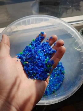 Plastic granulate polypropylene in hand Stock Photos