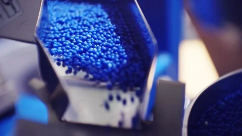 Plastic granules move along the production line Stock Footage 124259139