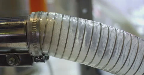 Plastic granules moving through transparent tube in factory Stock Footage 301086471