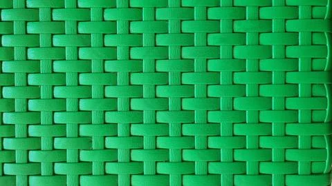 Plastic green weave pattern background Stock Photos