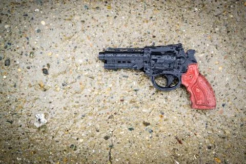 Plastic Gun in Rain Stock Photos
