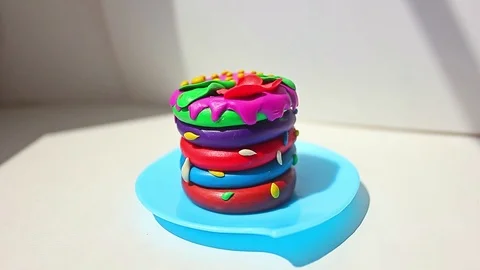 Plastic hamburger toy on white background with copy space Stock Footage