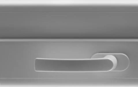 Plastic handle on the window. Stock Photos