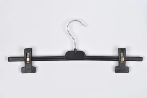 Plastic hanger with two clips Stock Photos