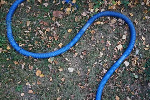 Plastic hose on the ground Stock Photos