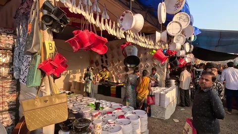 Plastic household items are being distributed in the fair Vídeo Stock 249815458