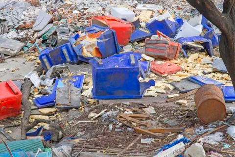 Plastic ice box old and broken into rubbish with garbage heaps. Stock Photos