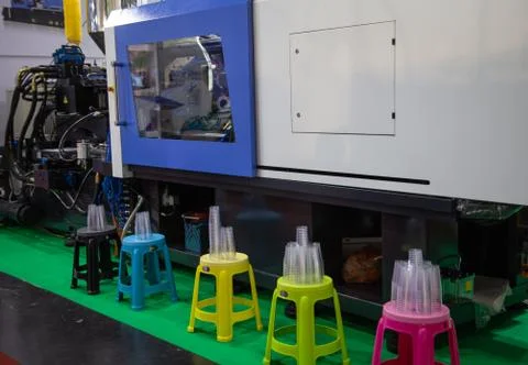 Plastic injection molding press machine Stock Photos