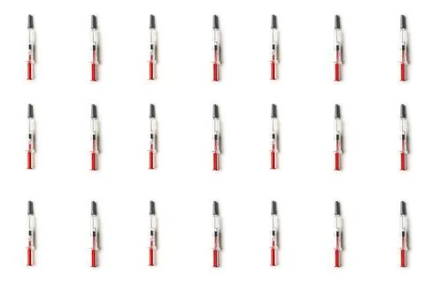 Plastic injectors pattern on white isolated Stock Photos