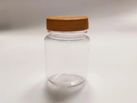 Plastic jar on white background Stock Photos