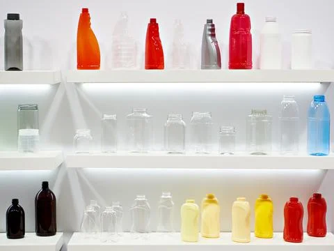 Plastic jars and bottles for liquid in store Stock Photos