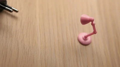 Plastic lamp cable table background Stock Footage 117630389