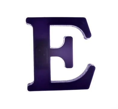 Plastic letter E on magnet isolated on white background, top view Stock Photos