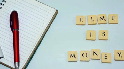 Plastic letter pieces with calculator, notepad and red pen Stock Footage 39364008