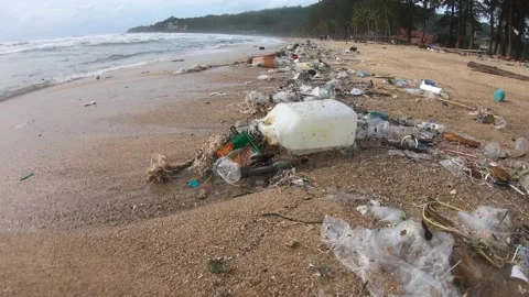 Plastic litter from Andaman Sea on beach, Southern  Thailand Stock Footage