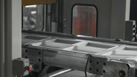 Plastic lunch boxes manufacture, disposable food package ware production line Stock Footage 100109386