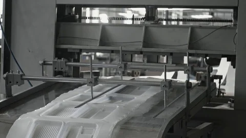 Plastic lunch boxes manufacture, disposable food package ware production line Stock Footage 100109631
