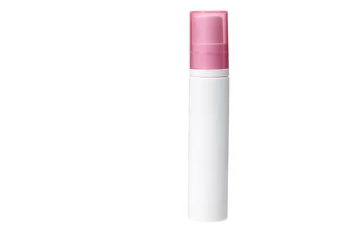 Plastic mat bottle with color cap and dispenser for body skin care cosmetic. Stock Photos