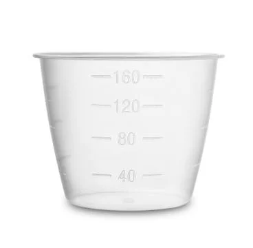 Plastic measuring cup Stock Photos