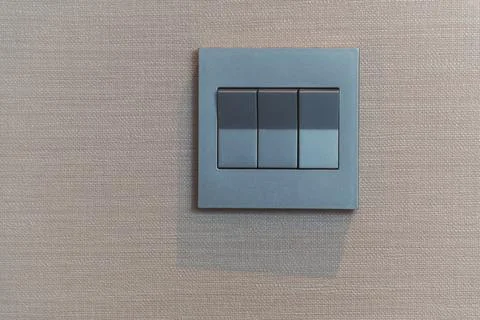 A plastic mechanical switch of gray color Stock Photos