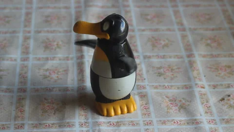 Plastic Mechanical Toy Spinning on Kitchen Table Video stock 315054391