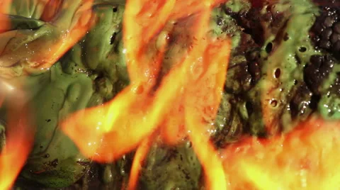 Plastic melting and burning in fire - closeup Stock Footage 57271966