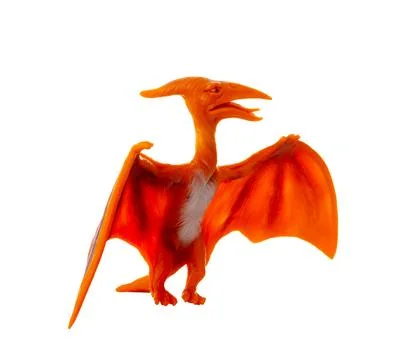 Plastic model of a pterosaur, a flying dinosaur, showcased against a clean .. Stock Photos