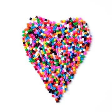 Plastic mosaic heart. Multi-colored children's mosaic Stock Photos