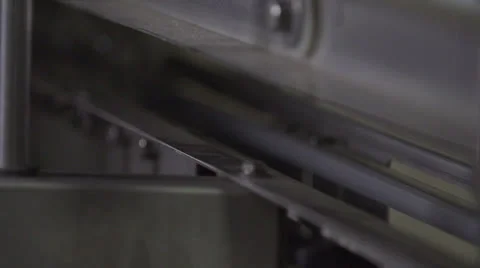 Plastic Moving Through a Machine In a Factory HD Video Stock Footage 25944889