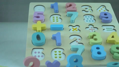 Plastic multi-colored numbers and letters of the English alphabet Stock Footage 134466651