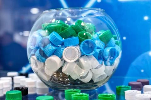 Plastic multi-colored threaded bottle caps. Stock Photos
