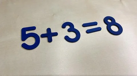 Plastic numbers and figures for the development of the child's intelligence Stock Photos