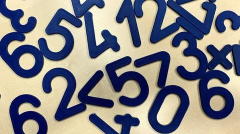 Plastic numbers and figures for the development of the child's intelligence Stock Photos