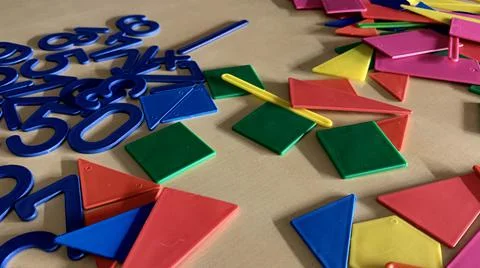 Plastic numbers and figures for the development of the child's intelligence Stock Photos