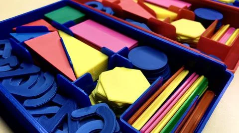 Plastic numbers and figures for the development of the child's intelligence Stock Photos