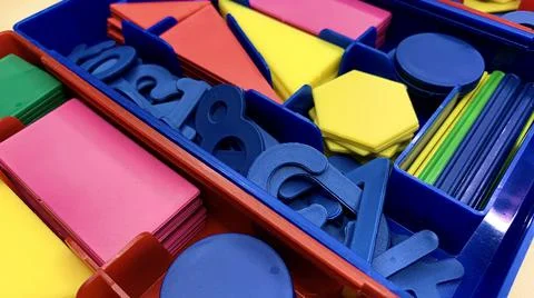 Plastic numbers and figures for the development of the child's intelligence Stock Photos