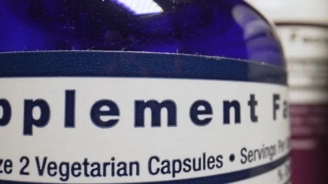 Plastic Nutritional Supplement Containers. Jars of Tablets, Fish oil, Omega 3 or Stock Footage 240456770