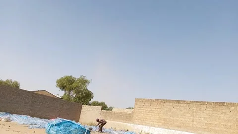 Plastic Nylons Drying In Open Field Kano Nigeria Видео 329676990