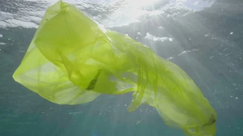 Plastic in the Ocean slow motion. Cinema High Quality footage. 4K Video stock 131209506