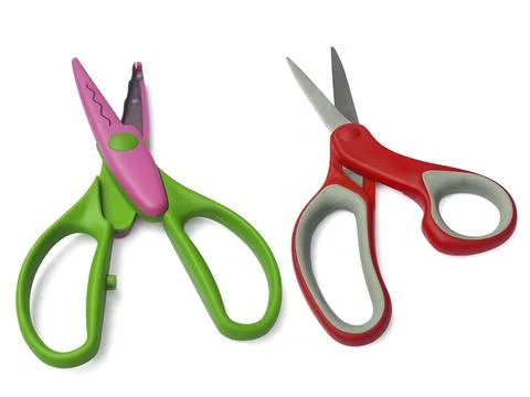Plastic open scissors and Red scissors isolated on a white background Stock Photos