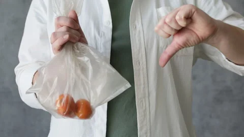 Plastic pack is bad. Choose reusable bag. Video stock 302790781