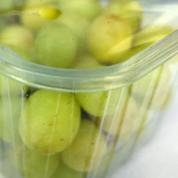 Plastic  package for grapes Stock Photos