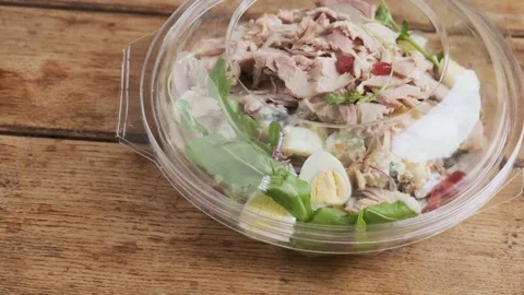 Plastic package with healthy baked ham salad for take away Stock-Footage 218454895