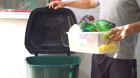 Plastic packaging waste recycling bin. Empty bottles and containers for recycle Stock Footage 127211518
