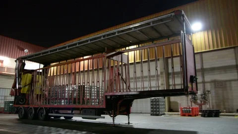 Plastic pallets store on warehouse yard, semi trailer Видео 95423958