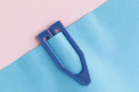 Plastic paperclip on a blank note Stock Photos