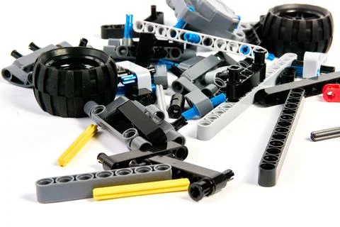 Plastic parts of the constructor, connecting elements and wheels for assemb.. Stock Photos