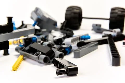 Plastic parts of the constructor, connecting elements and wheels for assemb.. Stock Photos